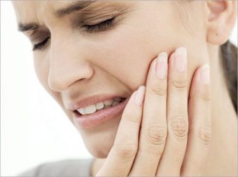 como aliviar a dor de dente